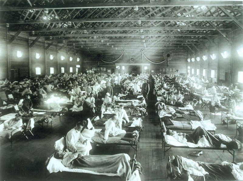 Soldiers from Fort Riley, Kansas, ill with Spanish influenza at a hospital ward at Camp Funston